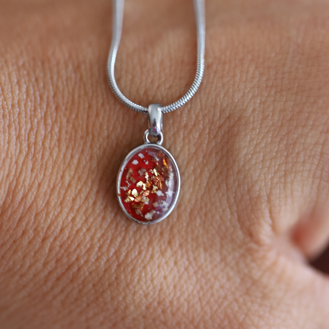 "Footprint" pendant with ashes or hair (stainless steel)