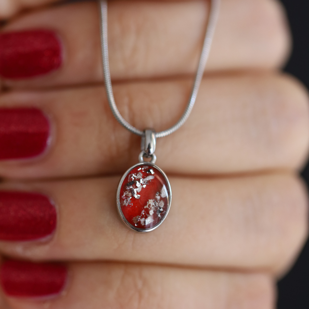 "Footprint" pendant with ashes or hair (stainless steel)